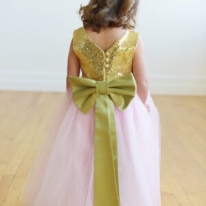 Gold and pink flower girl dress with a full tulle skirt.