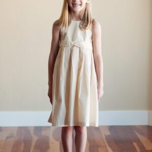 A Photo of a summer cotton flower girl dress in ivory or white