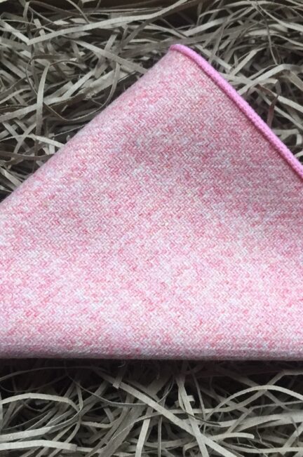 A photo of a blush pink wool pocket square