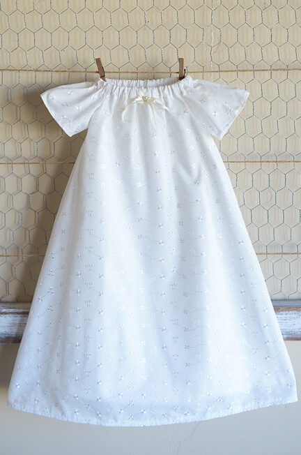 A photo of an embroidery anglaise christening dress