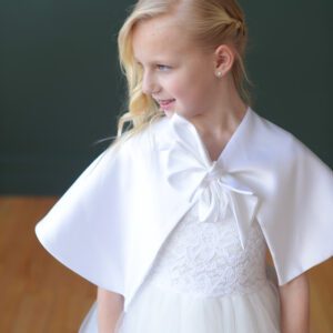 A white satin first communion satin cape to keep warm