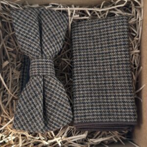 A photo of a brown checked hounds tooth bow tie and pocket square in wool ideal for weddings