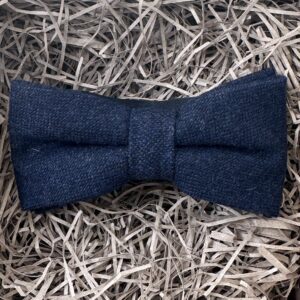 A photo of a navy wool bow tie