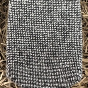 A photo of a light grey wool textured necktie ideal for weddings, formal and casual attire