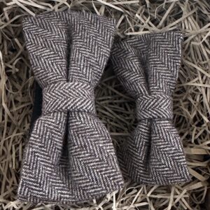 A photo of a brown herringbone wool bow tie for adult and child