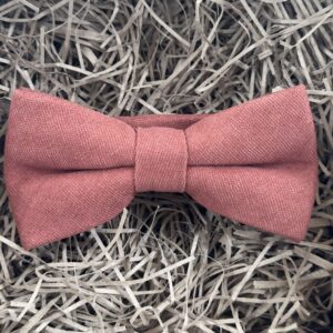 A photo of a terracotta cotton bow tie also available as a tie and pocket square set