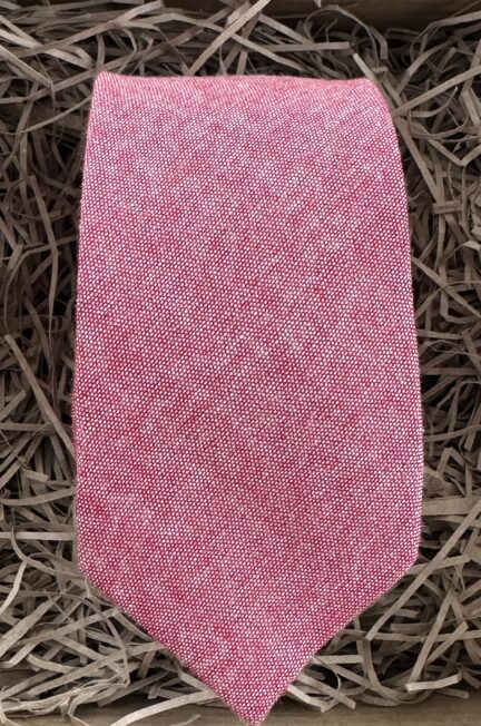 A photo of a dusty pink cotton tie