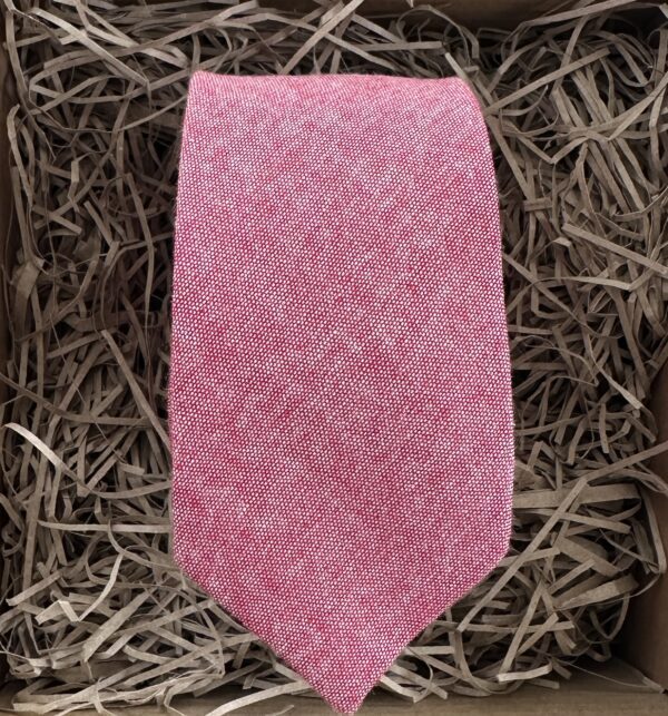 A photo of a dusty pink cotton tie