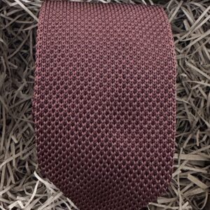 A photo of a brown knitted tie ideal for all occasions