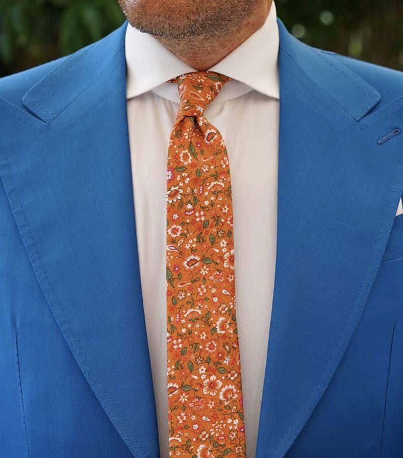 Orange wedding tie in a floral pattern ideal as mens gifts