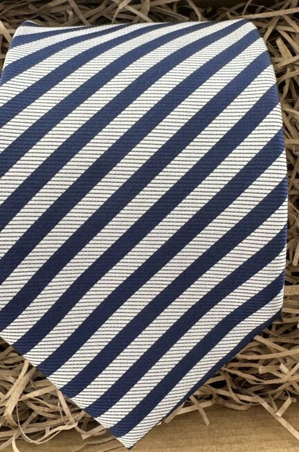 A photo of an 8 cm wide mens' necktie in a sliver and navy stripe.