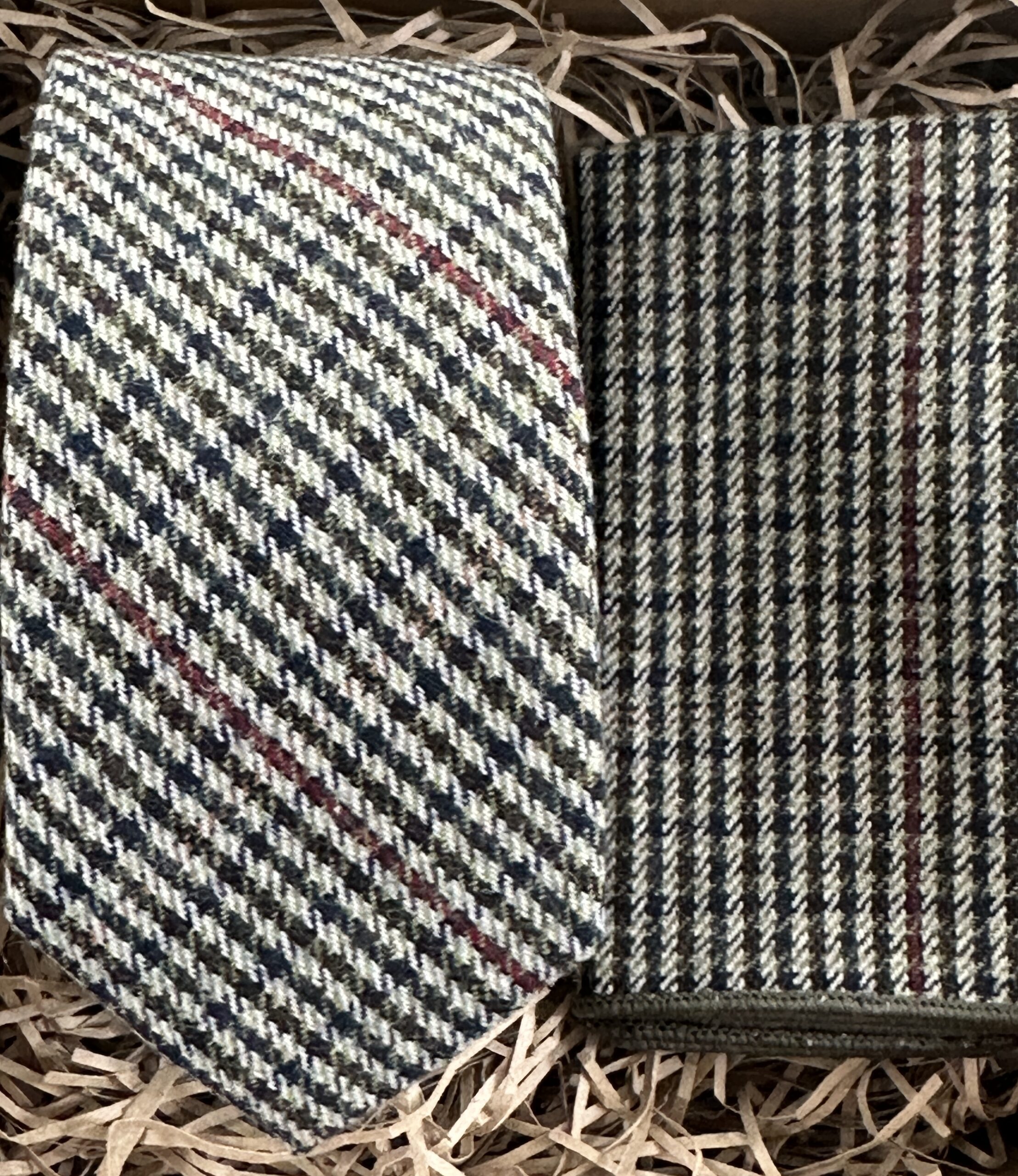 A photo of a check tie and pocket square ideal for a vintage style