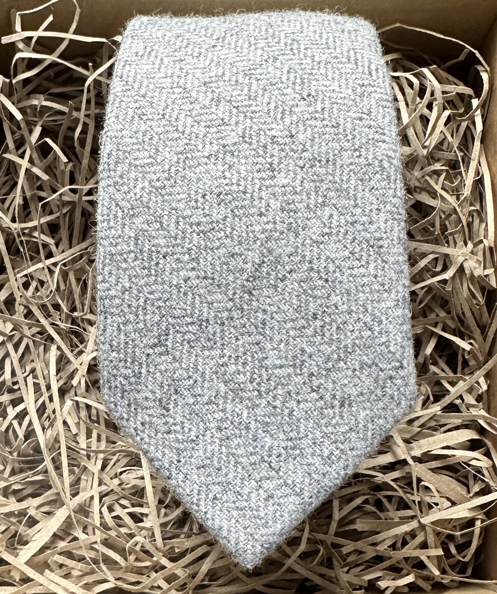 A light grey herringbone tie ideal for grooms and weddings
