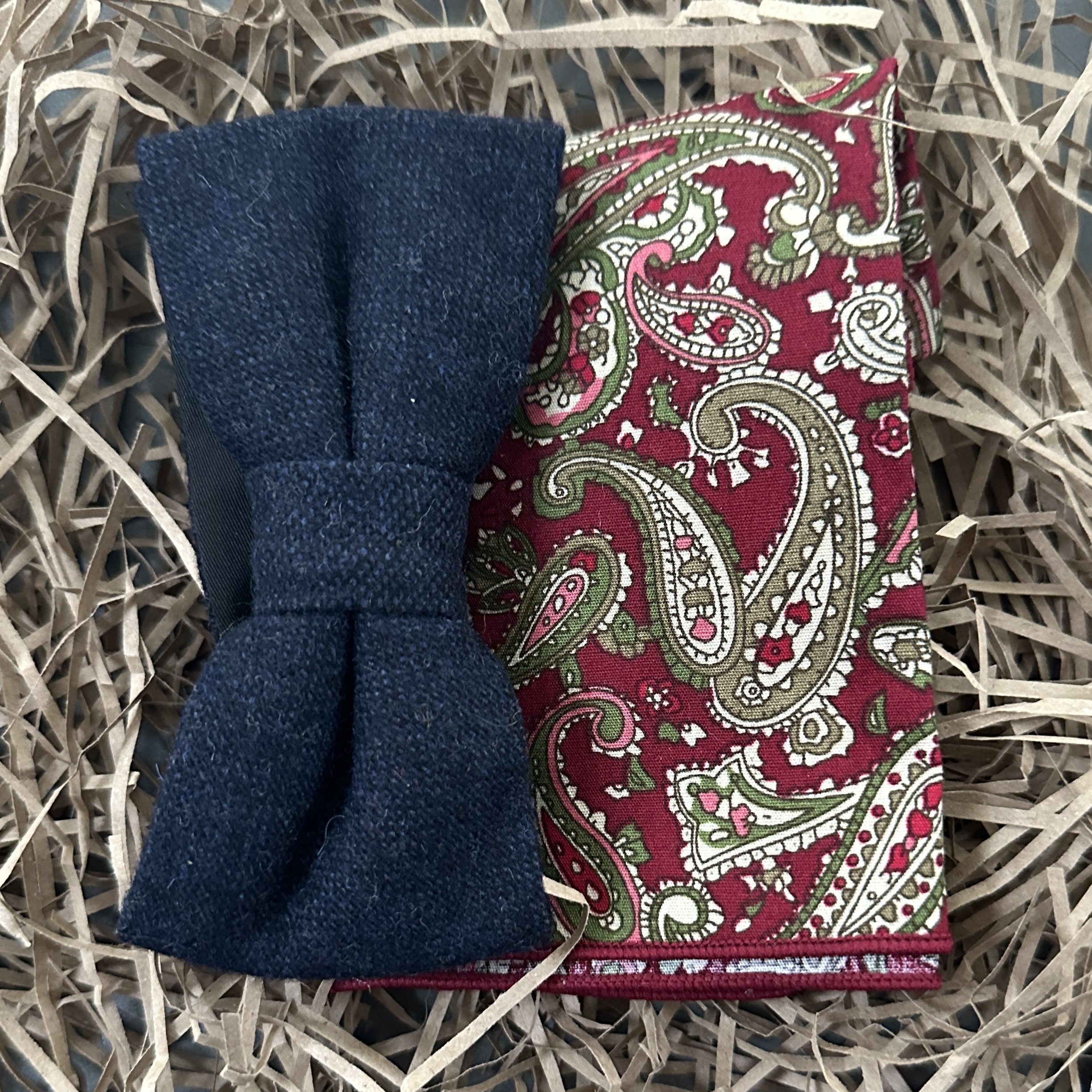 A blue wool bow tie and paisley red pocket square for weddings, groomsmen gifts and mens gifts