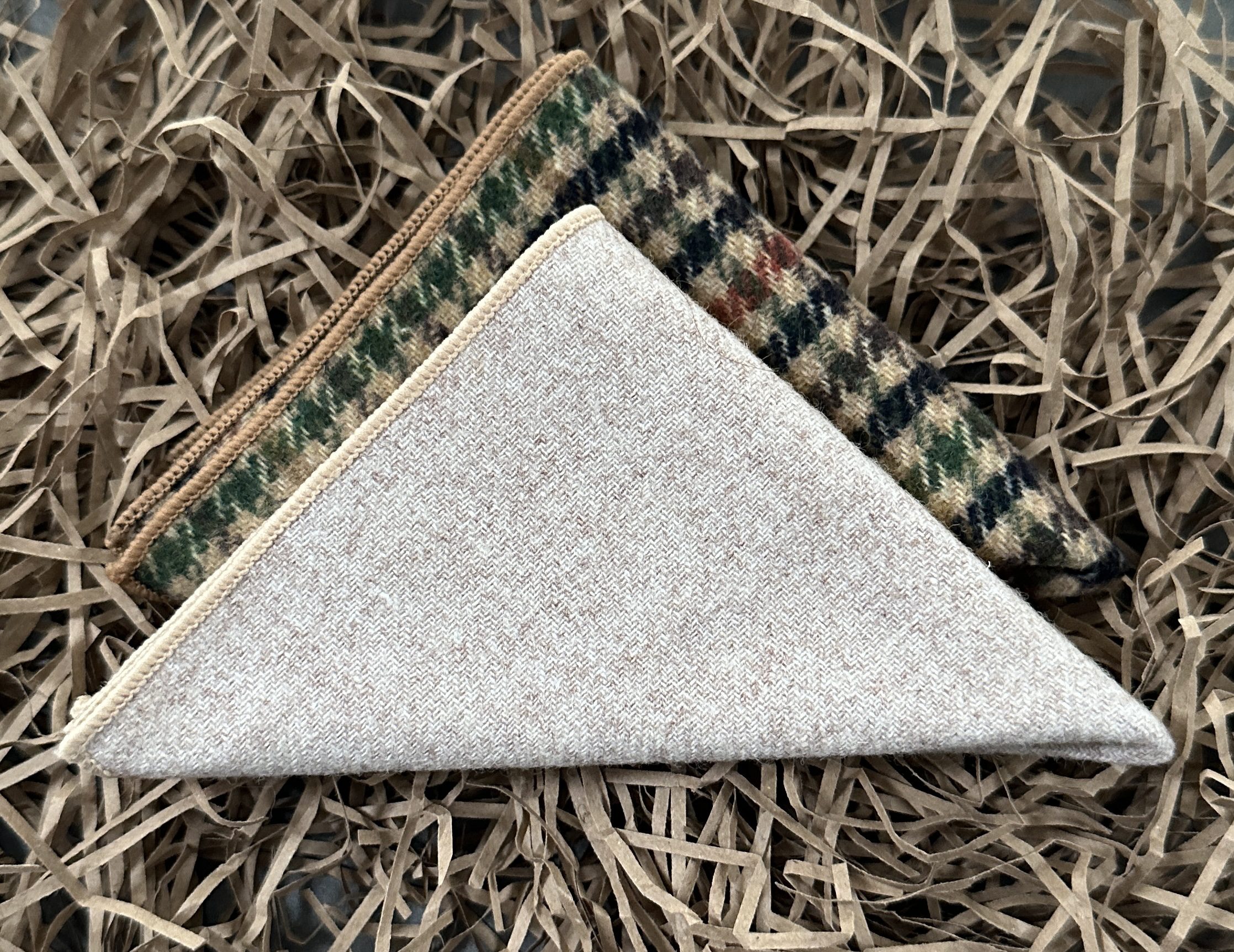 A set of two pocket squares one in check wool and the other in cream for mens's gifts and unique groomsmen gifts.
